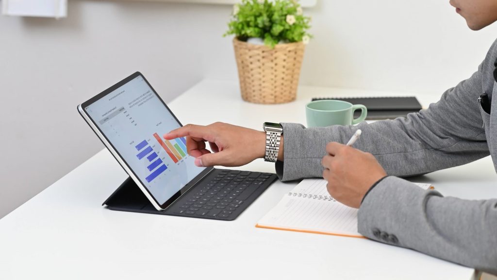 closeup-businessman-writing-and-analytic-finance-i-2022-03-29-08-46-50-utc.jpg